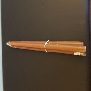 Bundle of caramel dinner candles